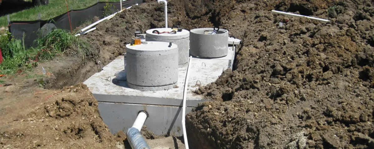 Septic system repair and installation site with tank access ports in Buffalo, NY
